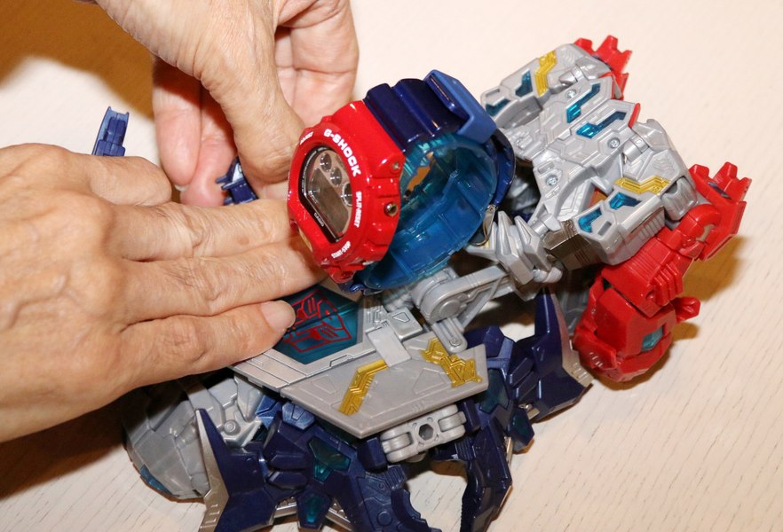 Transformers X G Shock Optimus Prime In Hand Images   Literally  (2 of 8)